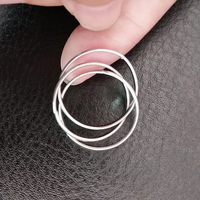 Elegant Triple Interlocking Ring – Stackable Three-Layer Statement Band for Women