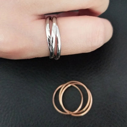 Elegant Triple Interlocking Ring – Stackable Three-Layer Statement Band for Women