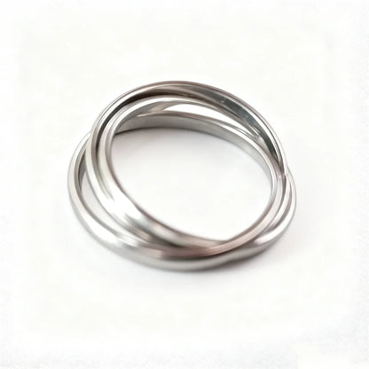 Elegant Triple Interlocking Ring – Stackable Three-Layer Statement Band for Women